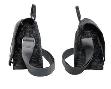 Two black and gray patterned bags with straps on a white background