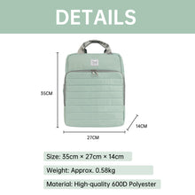Light green diaper backpack with dimensions and material details on a white background
