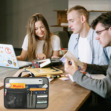 Three people studying together with a small bag containing stationery items on a table.