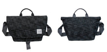 Two black camera shoulder bags with grid pattern on a white background